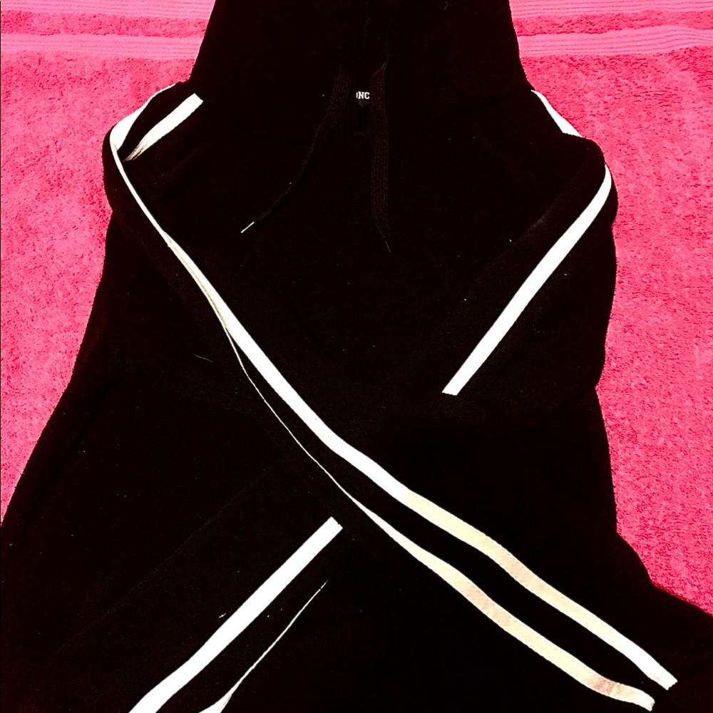 Black hoodie with white stripes.